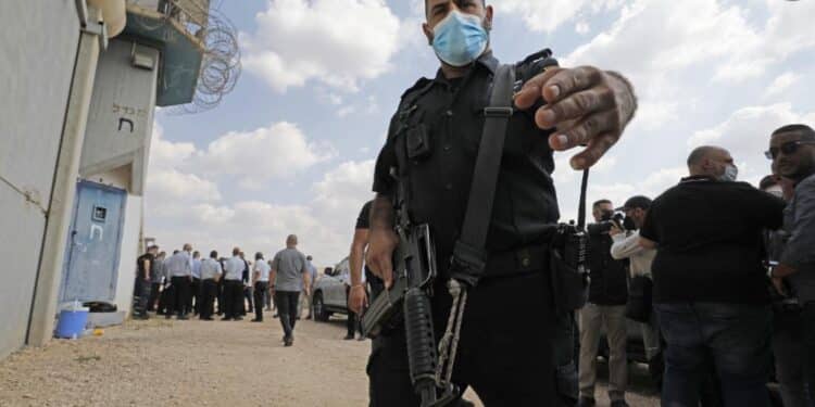 An Israeli officer gestures outside the Gilboa Prison in northern Israel 6 September 2021 AFP